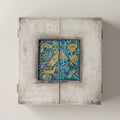 Willow Tree Starry Night Nativity, 8.5”h x 8”w x 2”d resin triptych with hinged doors, cream exterior with gold and blue details, doors open to 16”w with interior bas-relief Nativity scenes
