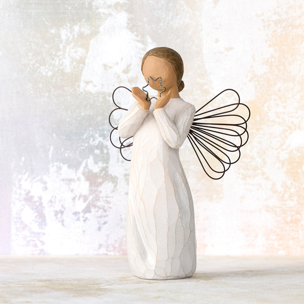 Willow Tree Bright Star, 6”h hand-painted standing resin angel figure in cream dress with wire wings, holding glittered wire star, in front of white painting